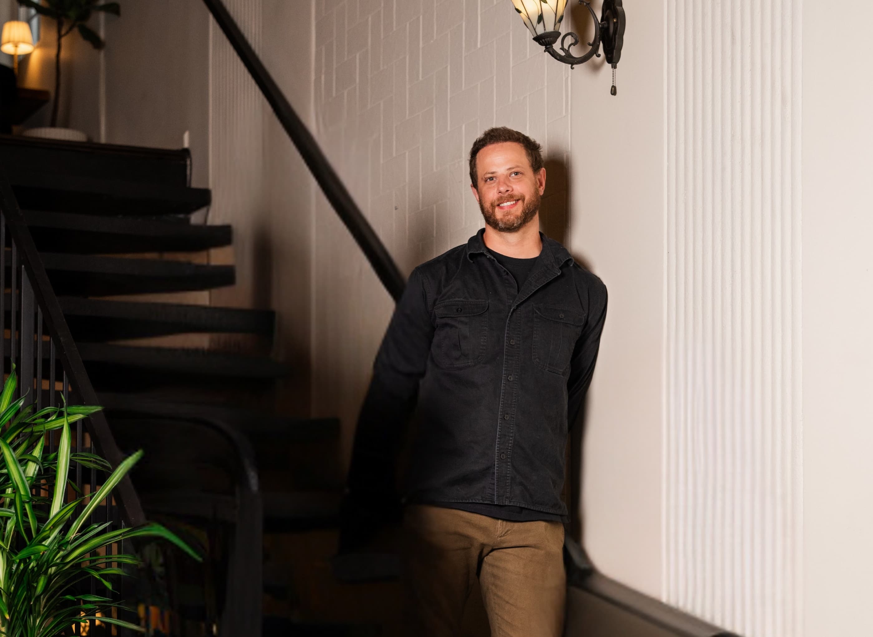 Joseph Croteau on the stairs at Chariot.