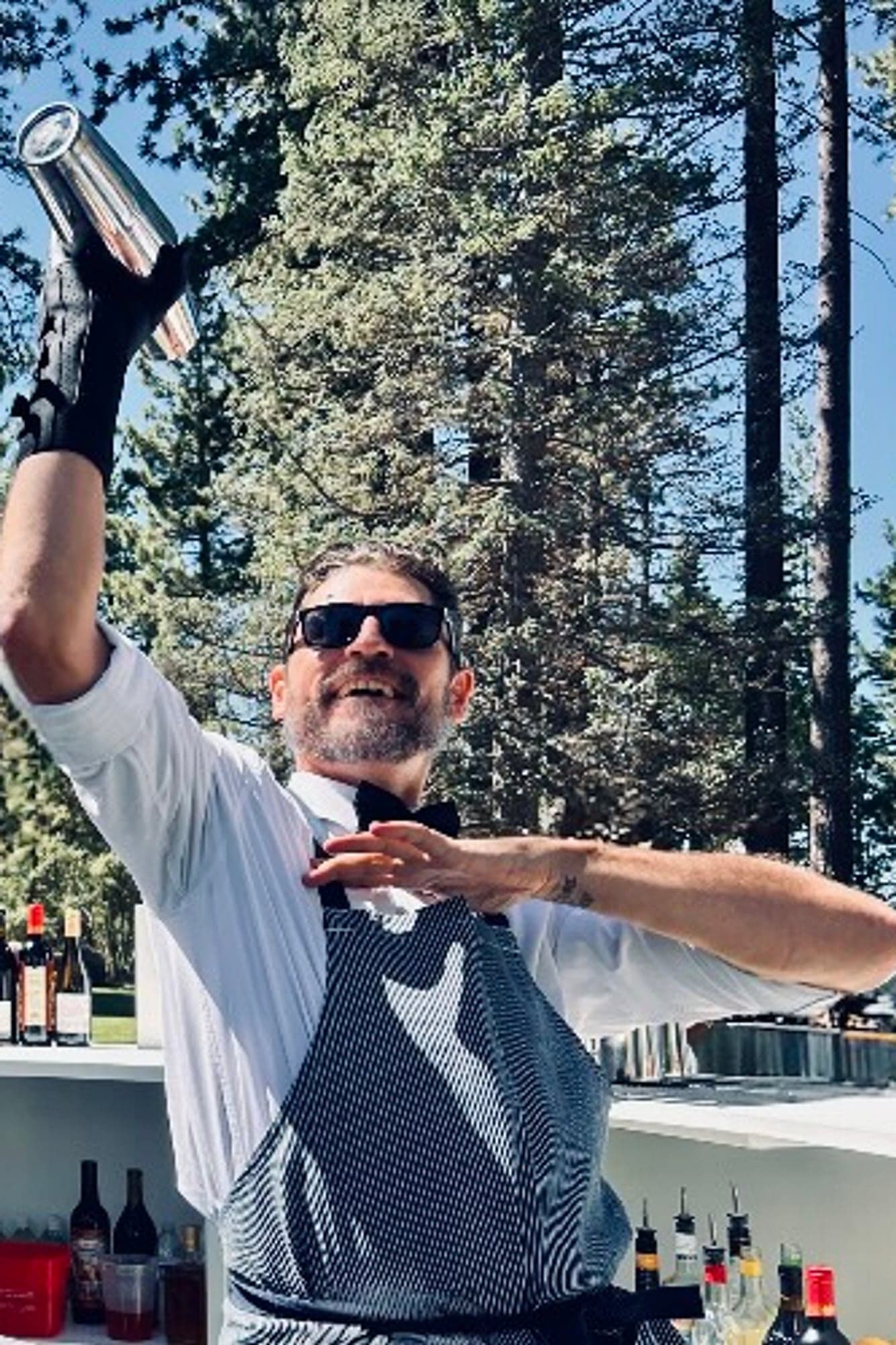 Robert Mason shaking a cocktail.